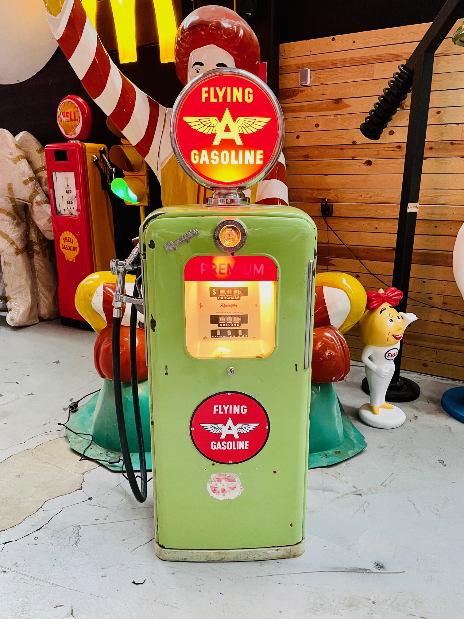 Flying gasoline American gas pump enamelled from the 50's