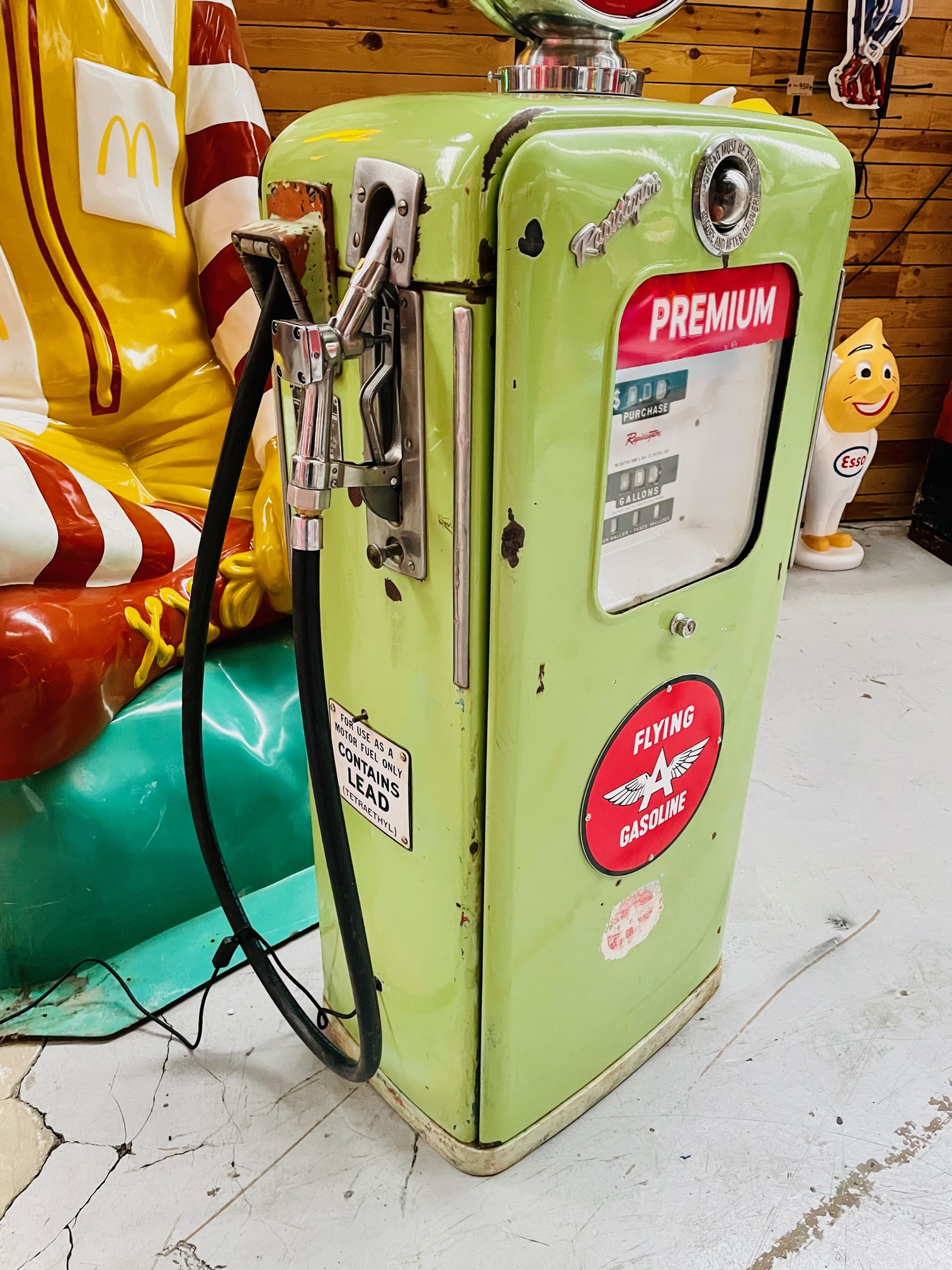 Flying gasoline American gas pump enamelled from the 50's