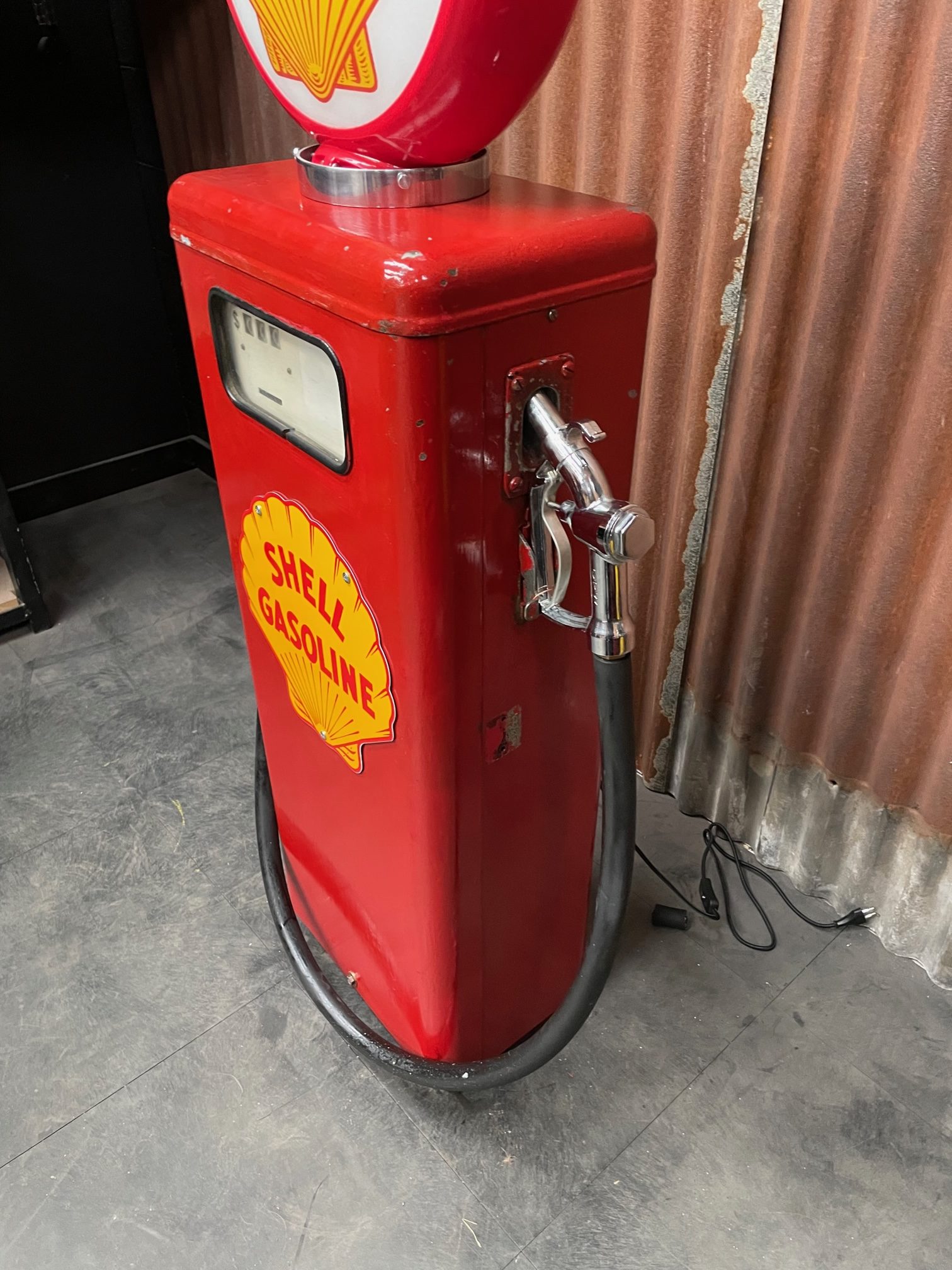 Shell American gas pump with its original patina.